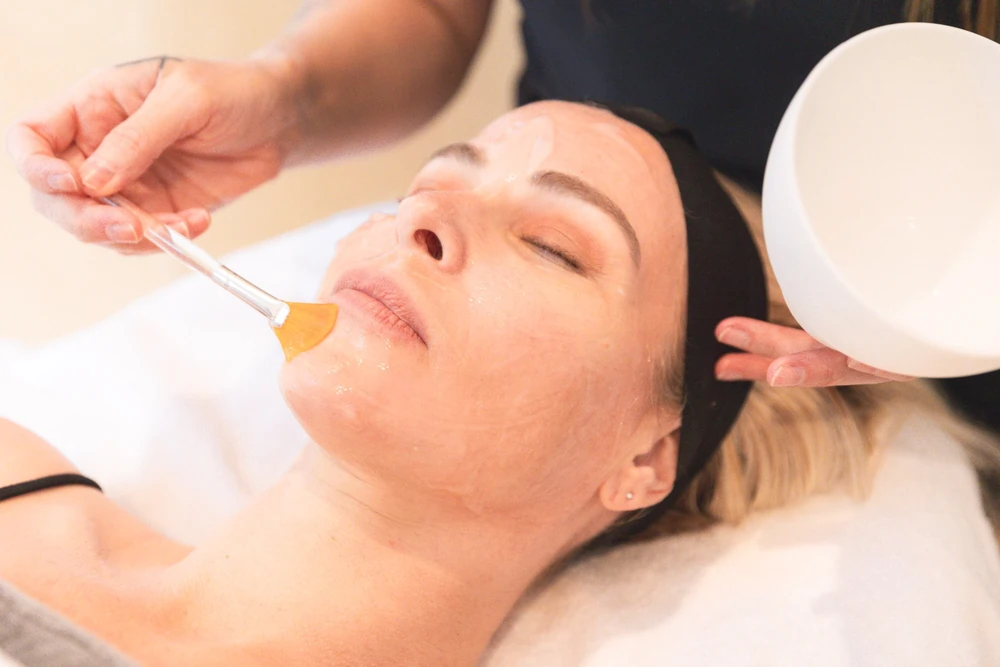 Skincare professional performing a VI Peel treatment at Park Place Medical Spa in Granger, IN, to rejuvenate and brighten the skin